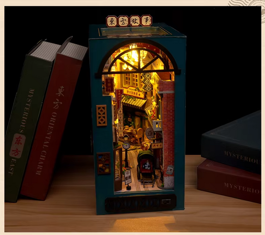 DIY bookshelf with an old village inside